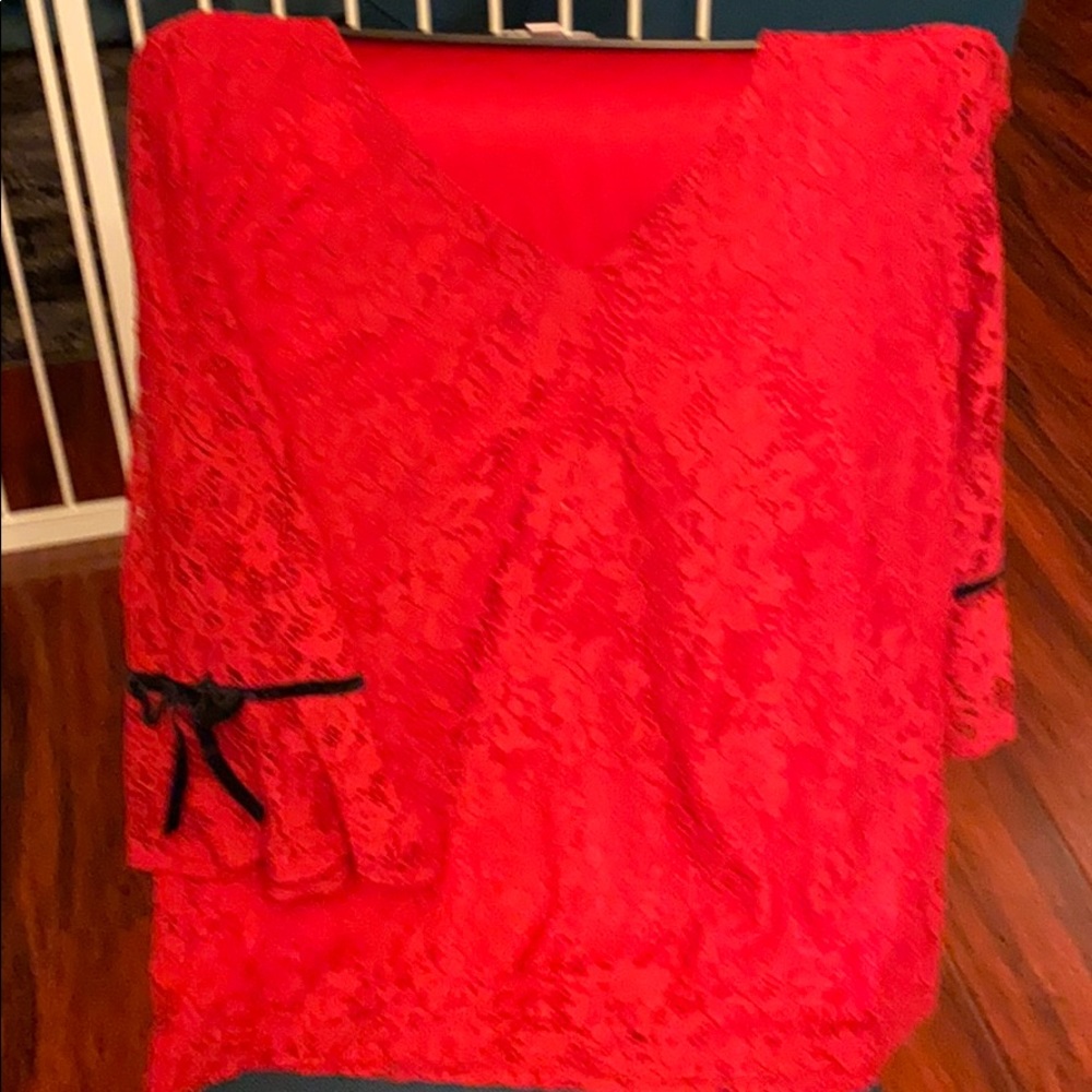 Red blouse.